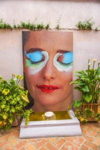 Picture of Jose Luis' wife with a hole in the mouth to make a fountain